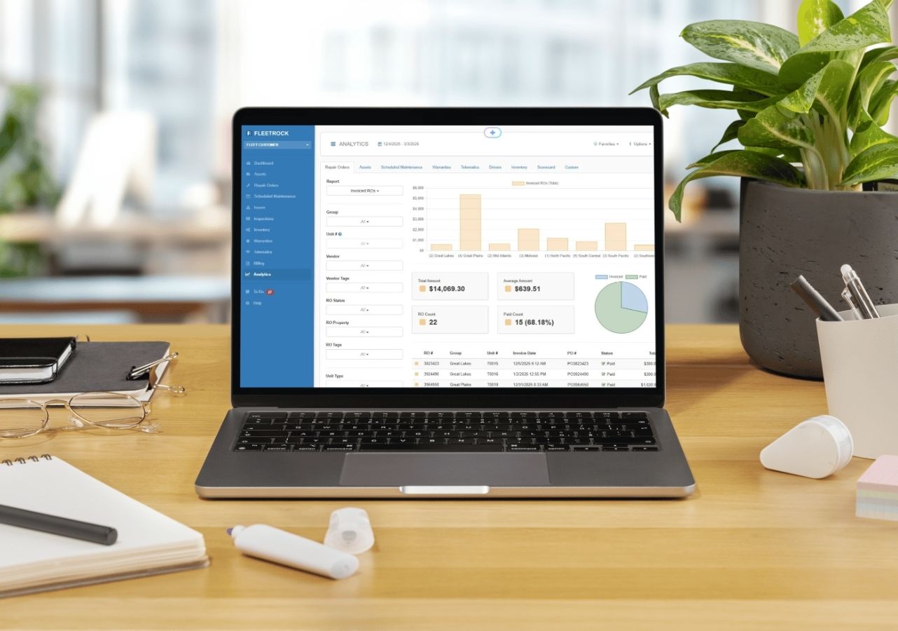 Fleetrock analytics dashboard showing repair order costs, totals, and status breakdown on a laptop